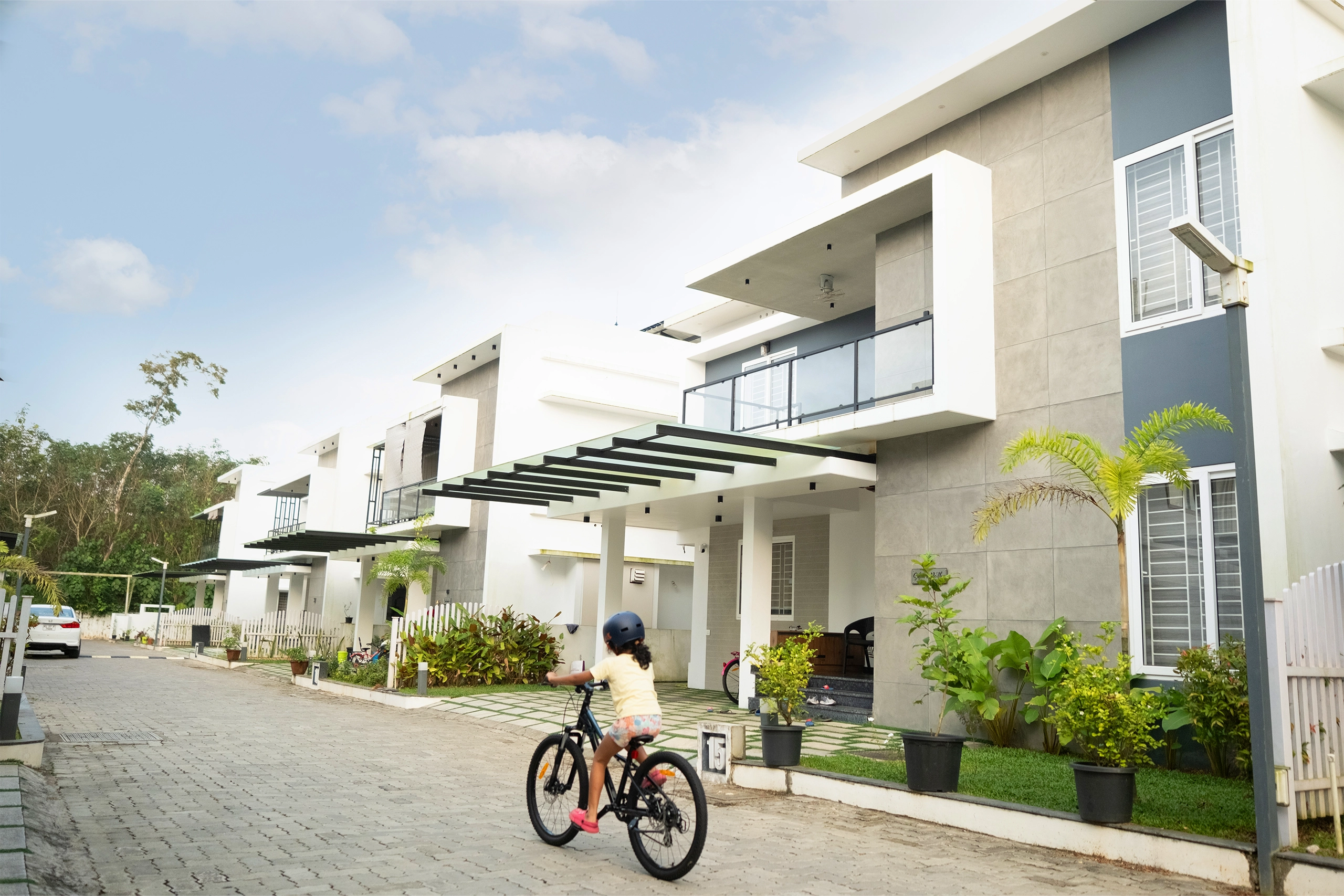 Gated community villas in Kakkanad Kochi with uniform elevation and modern residential layout